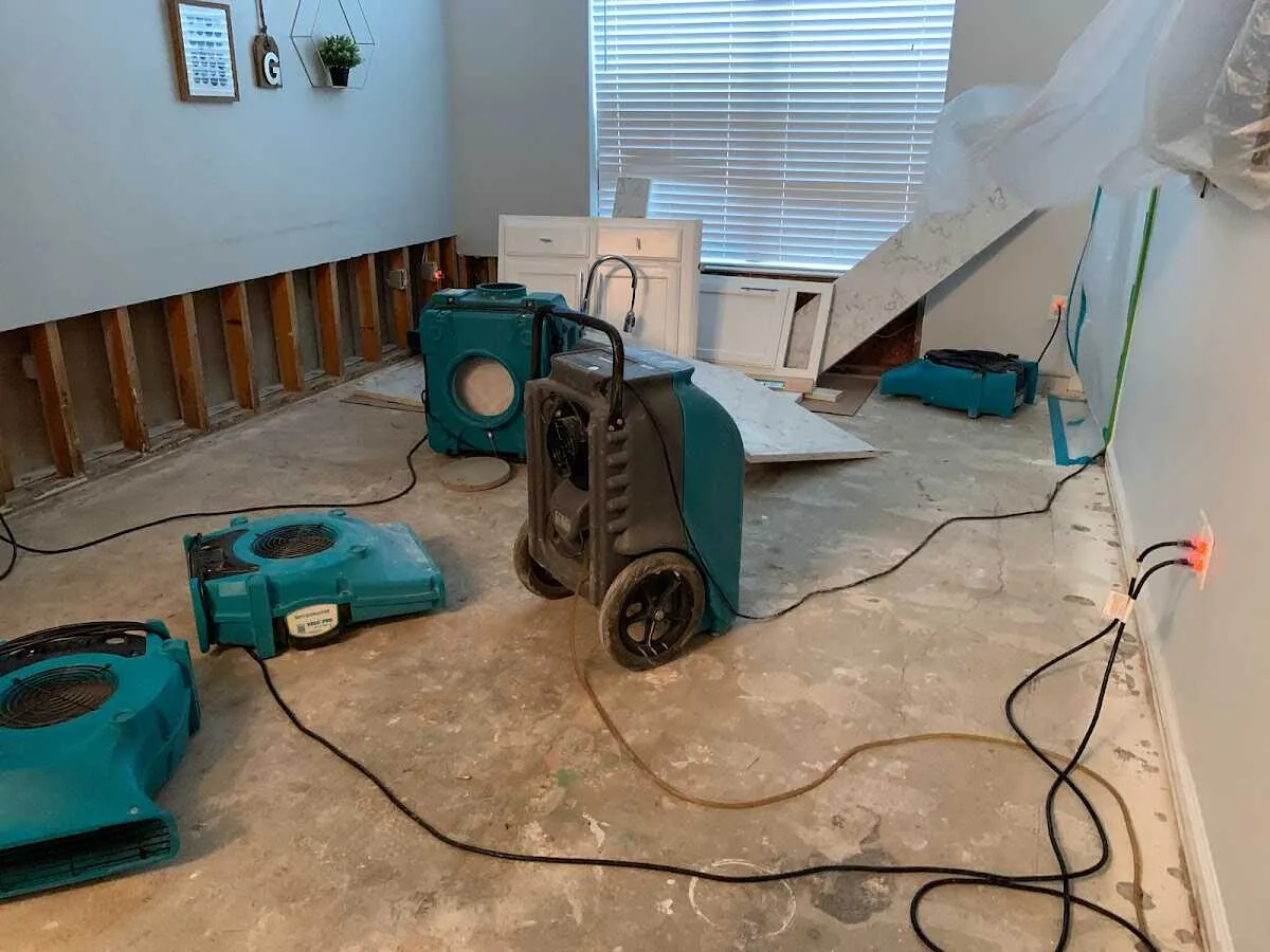 Dehumidifier in flood-cut room for Water Damage Restoration in East Bethel
